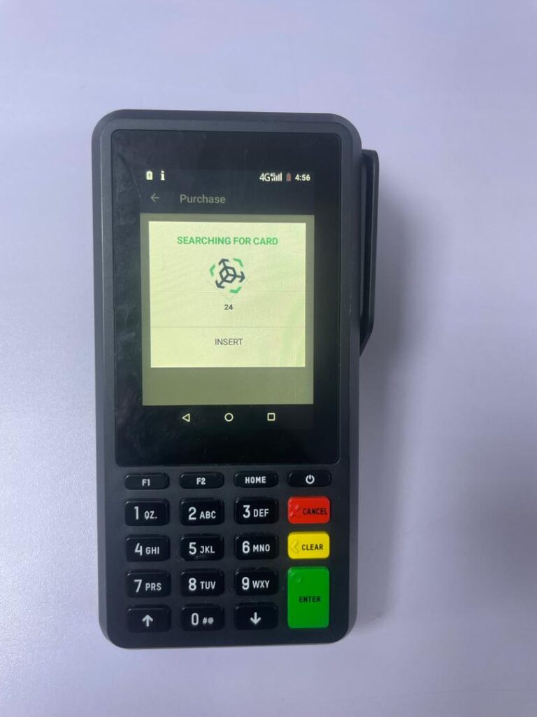 The Supply Smart POS is ready to accept a customer's payment. The screen shows 'Searching for Card' and instructs the user to insert their card for a purchase or withdrawal.