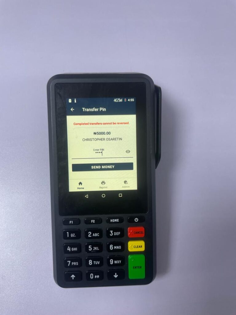 An agent's PIN entered securely as asterisks on the Supply Smart POS, ready to complete a 5,000 Naira money transfer.