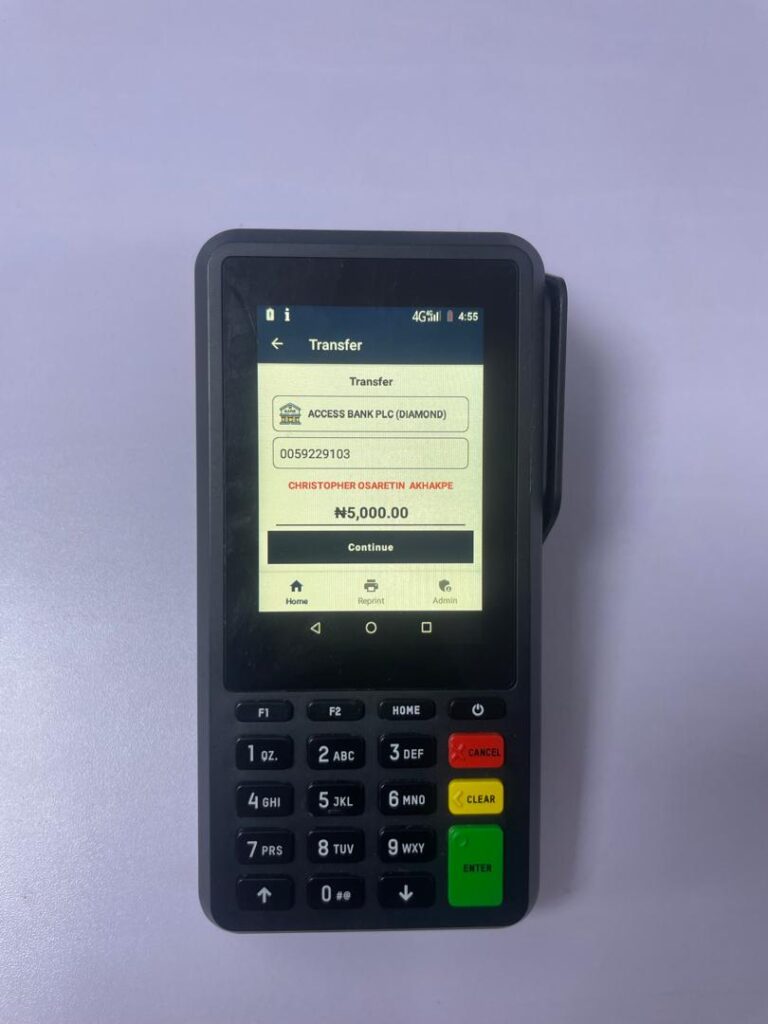 Confirming a 5,000 Naira transfer on the Supply Smart POS. The screen shows the recipient's name, account number, and the amount before the agent continues.
